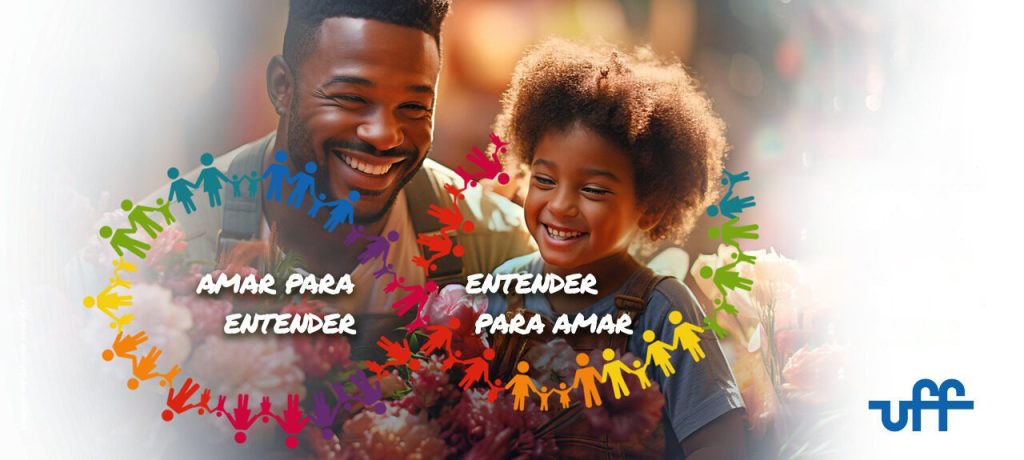 Card digital tendo ao centro a imagem de um homem e uma menina negros sorrindo Em volta das frases "Amar para entender e Entender para amar", em formato de círculo desenho colorido e estilizado de figuras humanas de mãos dadas Na parte inferior uma tarja azul, no canto direito o logo da UFF e o ícone da acessibilidade em libras.